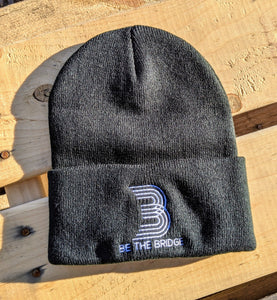 Black beanie with 'B' and 'Be the Bridge' in white lettering.